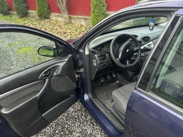 Синий Форд Фокус, объемом двигателя 1.8 л и пробегом 300 тыс. км за 1300 $, фото 5 на Automoto.ua