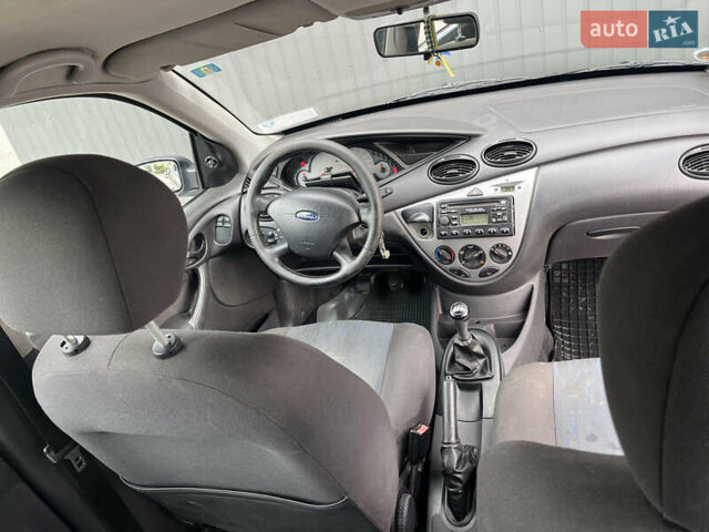 Синій Форд Фокус, об'ємом двигуна 1.6 л та пробігом 260 тис. км за 2600 $, фото 17 на Automoto.ua