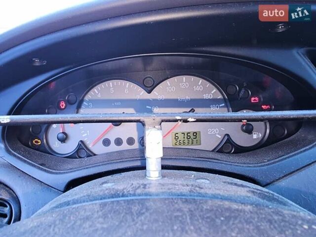 Синий Форд Фокус, объемом двигателя 1.6 л и пробегом 270 тыс. км за 4300 $, фото 2 на Automoto.ua
