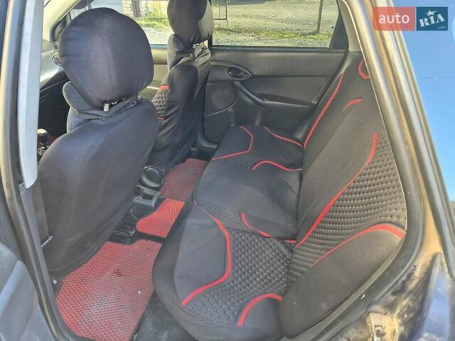 Синий Форд Фокус, объемом двигателя 1.8 л и пробегом 341 тыс. км за 2800 $, фото 5 на Automoto.ua