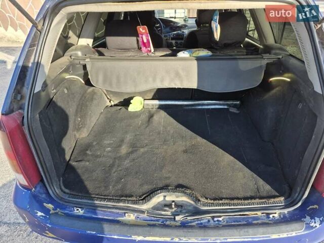 Синий Форд Фокус, объемом двигателя 1.8 л и пробегом 341 тыс. км за 2800 $, фото 6 на Automoto.ua