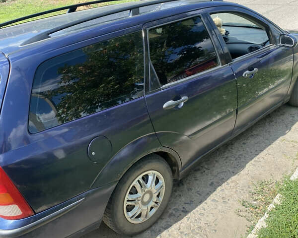 Синий Форд Фокус, объемом двигателя 1.8 л и пробегом 365 тыс. км за 3250 $, фото 3 на Automoto.ua