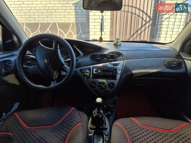 Синий Форд Фокус, объемом двигателя 1.8 л и пробегом 341 тыс. км за 2800 $, фото 3 на Automoto.ua