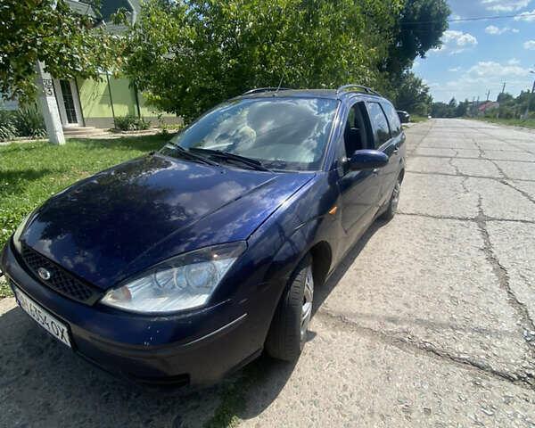 Синий Форд Фокус, объемом двигателя 1.8 л и пробегом 365 тыс. км за 3250 $, фото 6 на Automoto.ua