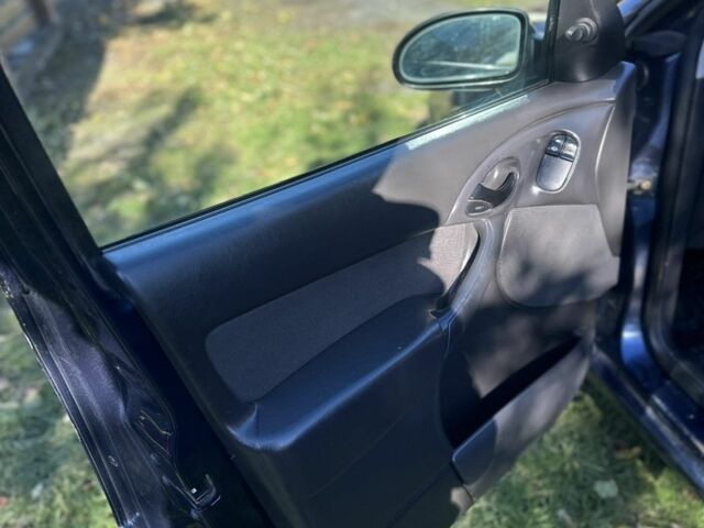 Форд Фокус 2004 в Жовкве на Automoto.ua Синий Форд Фокус, объемом двигателя 1.8 л и пробегом 250 тыс. км за 1599 $, фото 10 на Automoto.ua