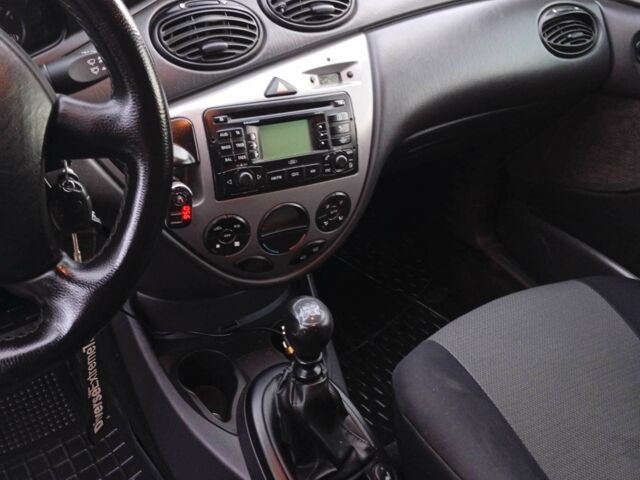 Синий Форд Фокус, объемом двигателя 1.8 л и пробегом 480 тыс. км за 3400 $, фото 15 на Automoto.ua