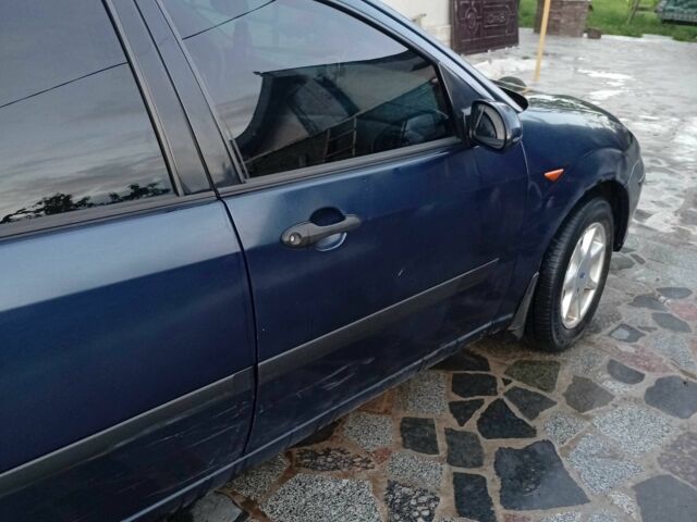 Синий Форд Фокус, объемом двигателя 1.8 л и пробегом 480 тыс. км за 3400 $, фото 7 на Automoto.ua