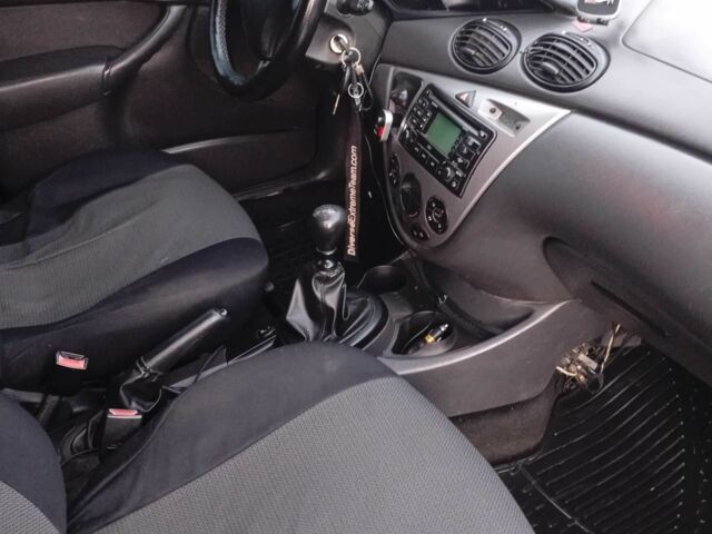 Синий Форд Фокус, объемом двигателя 1.8 л и пробегом 480 тыс. км за 3400 $, фото 11 на Automoto.ua