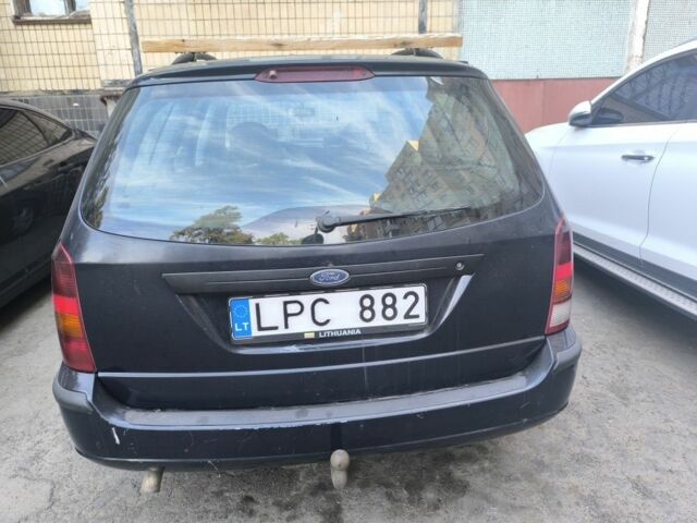 Синий Форд Фокус, объемом двигателя 1.8 л и пробегом 266 тыс. км за 900 $, фото 2 на Automoto.ua