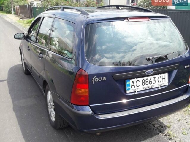 Синий Форд Фокус, объемом двигателя 1.8 л и пробегом 260 тыс. км за 4400 $, фото 5 на Automoto.ua