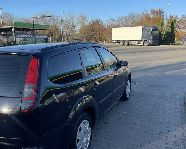Синій Форд Фокус, об'ємом двигуна 1.6 л та пробігом 259 тис. км за 4100 $, фото 3 на Automoto.ua