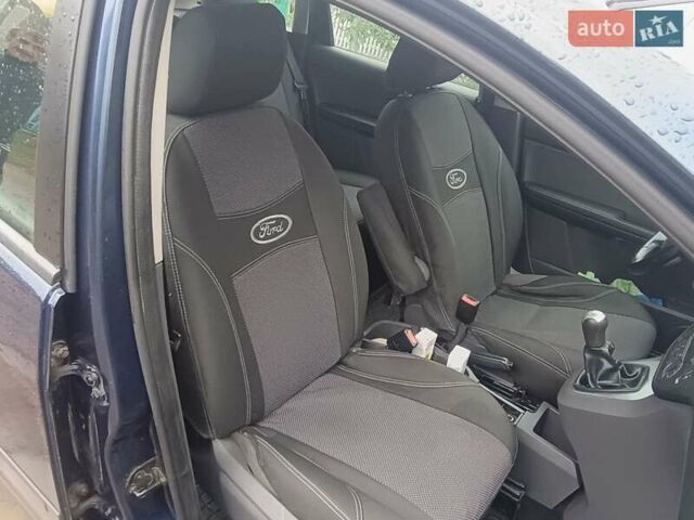 Синій Форд Фокус, об'ємом двигуна 1.8 л та пробігом 192 тис. км за 4300 $, фото 11 на Automoto.ua