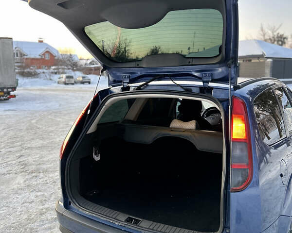 Синій Форд Фокус, об'ємом двигуна 1.8 л та пробігом 400 тис. км за 4500 $, фото 15 на Automoto.ua