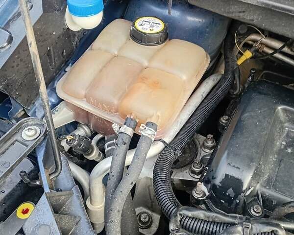 Синій Форд Фокус, об'ємом двигуна 1.8 л та пробігом 287 тис. км за 4650 $, фото 14 на Automoto.ua