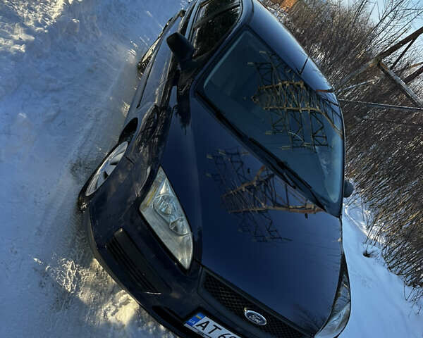 Синій Форд Фокус, об'ємом двигуна 1.6 л та пробігом 406 тис. км за 2999 $, фото 3 на Automoto.ua