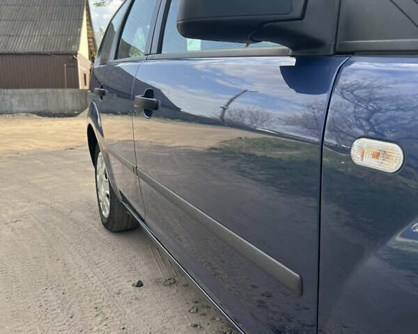 Синій Форд Фокус, об'ємом двигуна 1.6 л та пробігом 235 тис. км за 4650 $, фото 12 на Automoto.ua