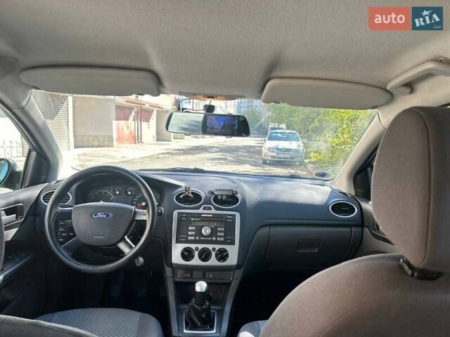 Синій Форд Фокус, об'ємом двигуна 1.6 л та пробігом 296 тис. км за 4600 $, фото 14 на Automoto.ua