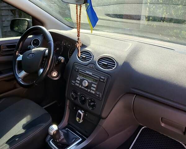 Синий Форд Фокус, объемом двигателя 1.6 л и пробегом 210 тыс. км за 5200 $, фото 23 на Automoto.ua