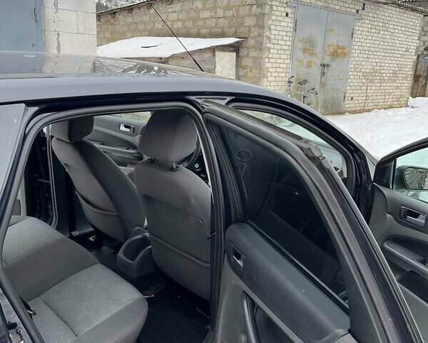 Синий Форд Фокус, объемом двигателя 1.56 л и пробегом 300 тыс. км за 4200 $, фото 21 на Automoto.ua