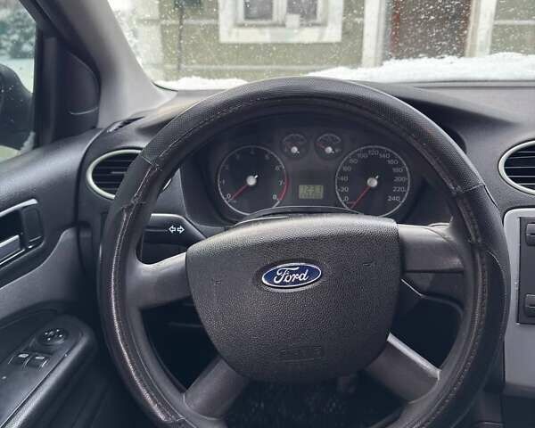 Синий Форд Фокус, объемом двигателя 1.4 л и пробегом 266 тыс. км за 3700 $, фото 6 на Automoto.ua