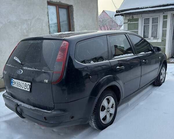 Синий Форд Фокус, объемом двигателя 1.4 л и пробегом 266 тыс. км за 3700 $, фото 4 на Automoto.ua