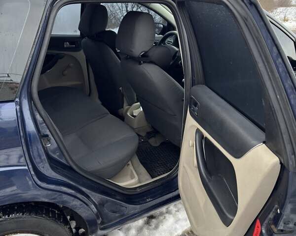 Синій Форд Фокус, об'ємом двигуна 1.6 л та пробігом 404 тис. км за 2956 $, фото 6 на Automoto.ua