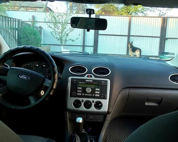 Синий Форд Фокус, объемом двигателя 1.4 л и пробегом 275 тыс. км за 4300 $, фото 13 на Automoto.ua