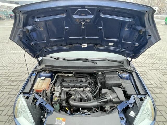 Синий Форд Фокус, объемом двигателя 1.6 л и пробегом 235 тыс. км за 4500 $, фото 11 на Automoto.ua