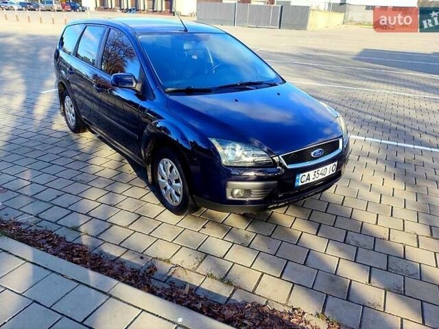 Синій Форд Фокус, об'ємом двигуна 1.6 л та пробігом 253 тис. км за 4700 $, фото 4 на Automoto.ua