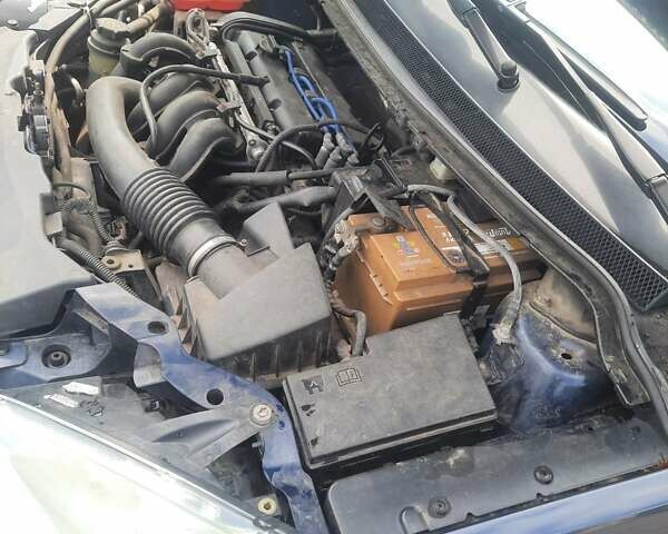 Синий Форд Фокус, объемом двигателя 1.6 л и пробегом 250 тыс. км за 4800 $, фото 21 на Automoto.ua