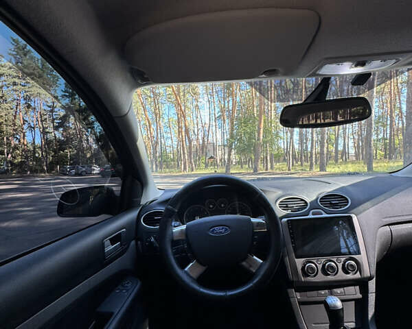 Синій Форд Фокус, об'ємом двигуна 1.6 л та пробігом 216 тис. км за 5200 $, фото 20 на Automoto.ua