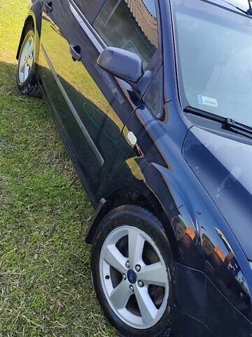 Синий Форд Фокус, объемом двигателя 1.6 л и пробегом 274 тыс. км за 4300 $, фото 13 на Automoto.ua