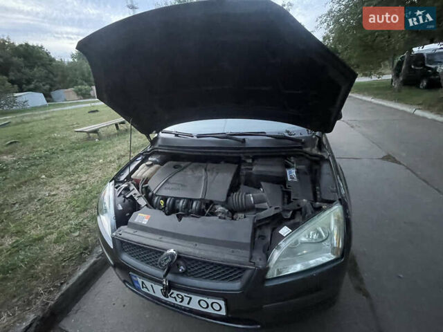 Синий Форд Фокус, объемом двигателя 1.8 л и пробегом 188 тыс. км за 5500 $, фото 18 на Automoto.ua