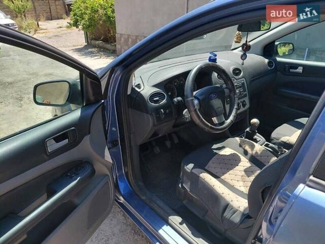 Синий Форд Фокус, объемом двигателя 1.56 л и пробегом 310 тыс. км за 3400 $, фото 11 на Automoto.ua