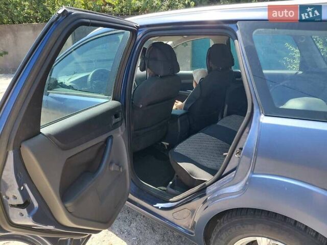 Синий Форд Фокус, объемом двигателя 1.56 л и пробегом 310 тыс. км за 3400 $, фото 12 на Automoto.ua