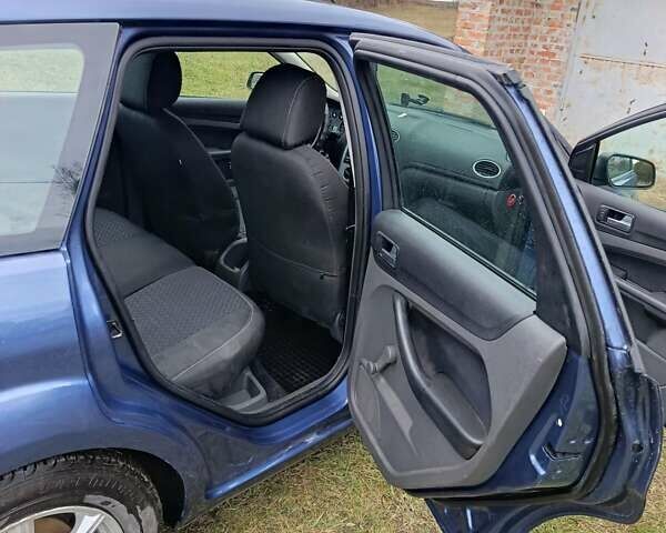 Синій Форд Фокус, об'ємом двигуна 1.6 л та пробігом 299 тис. км за 5000 $, фото 11 на Automoto.ua