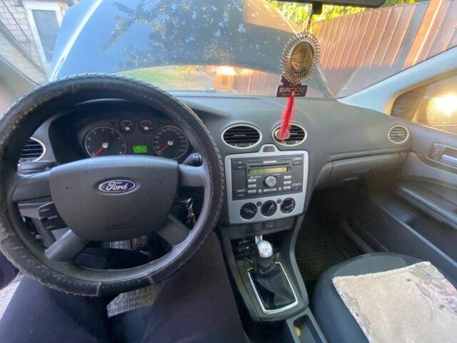 Синий Форд Фокус, объемом двигателя 1.8 л и пробегом 125 тыс. км за 4550 $, фото 2 на Automoto.ua