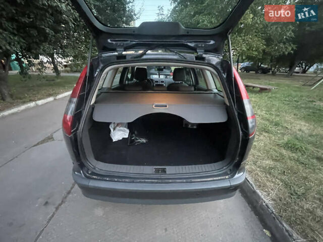 Синий Форд Фокус, объемом двигателя 1.8 л и пробегом 188 тыс. км за 5500 $, фото 12 на Automoto.ua