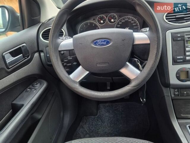 Синій Форд Фокус, об'ємом двигуна 1.6 л та пробігом 213 тис. км за 5450 $, фото 20 на Automoto.ua