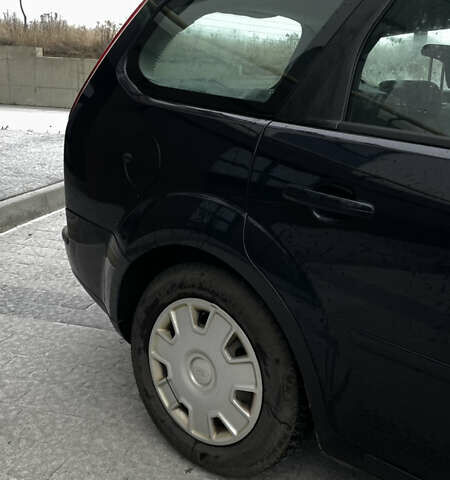 Синій Форд Фокус, об'ємом двигуна 1.8 л та пробігом 213 тис. км за 5200 $, фото 4 на Automoto.ua