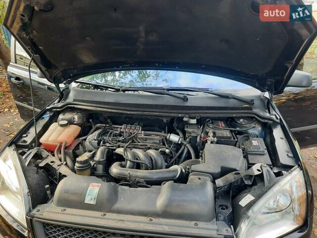 Синий Форд Фокус, объемом двигателя 1.6 л и пробегом 360 тыс. км за 4550 $, фото 102 на Automoto.ua