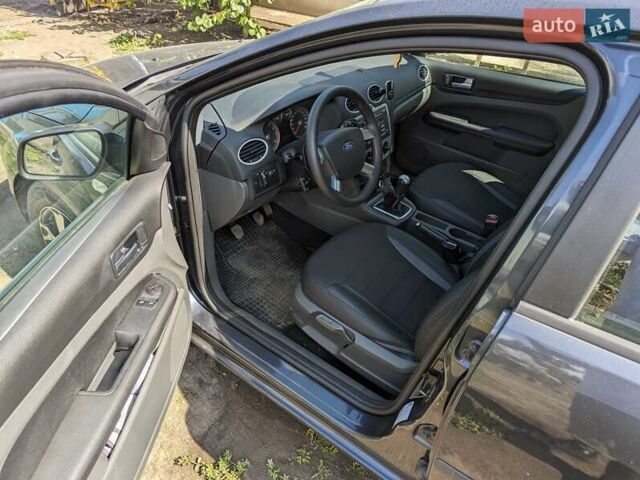 Синий Форд Фокус, объемом двигателя 1.6 л и пробегом 211 тыс. км за 5800 $, фото 7 на Automoto.ua