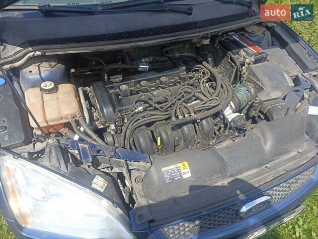 Синий Форд Фокус, объемом двигателя 1.8 л и пробегом 255 тыс. км за 4300 $, фото 21 на Automoto.ua