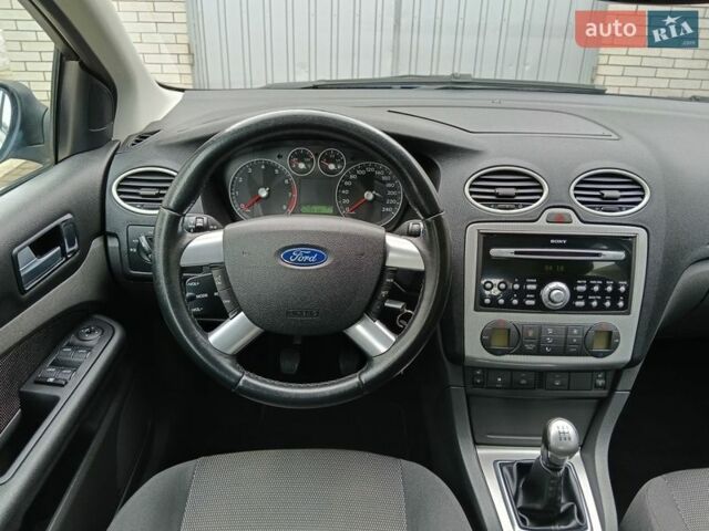Синий Форд Фокус, объемом двигателя 1.8 л и пробегом 202 тыс. км за 5500 $, фото 30 на Automoto.ua