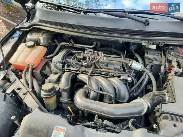 Синий Форд Фокус, объемом двигателя 1.6 л и пробегом 360 тыс. км за 4550 $, фото 105 на Automoto.ua