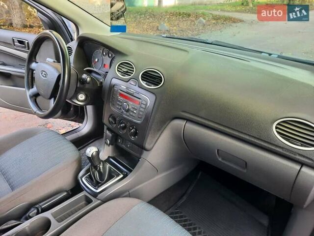 Синий Форд Фокус, объемом двигателя 1.6 л и пробегом 360 тыс. км за 4550 $, фото 72 на Automoto.ua