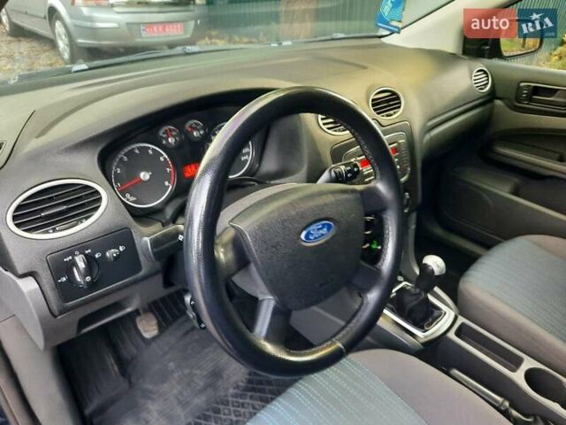 Синий Форд Фокус, объемом двигателя 1.6 л и пробегом 360 тыс. км за 4550 $, фото 20 на Automoto.ua