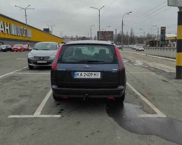 Синий Форд Фокус, объемом двигателя 1.8 л и пробегом 193 тыс. км за 5000 $, фото 4 на Automoto.ua