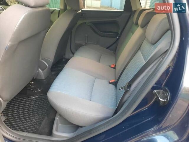 Синий Форд Фокус, объемом двигателя 1.6 л и пробегом 360 тыс. км за 4550 $, фото 18 на Automoto.ua