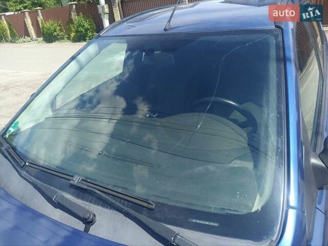 Синий Форд Фокус, объемом двигателя 1.8 л и пробегом 255 тыс. км за 4300 $, фото 7 на Automoto.ua